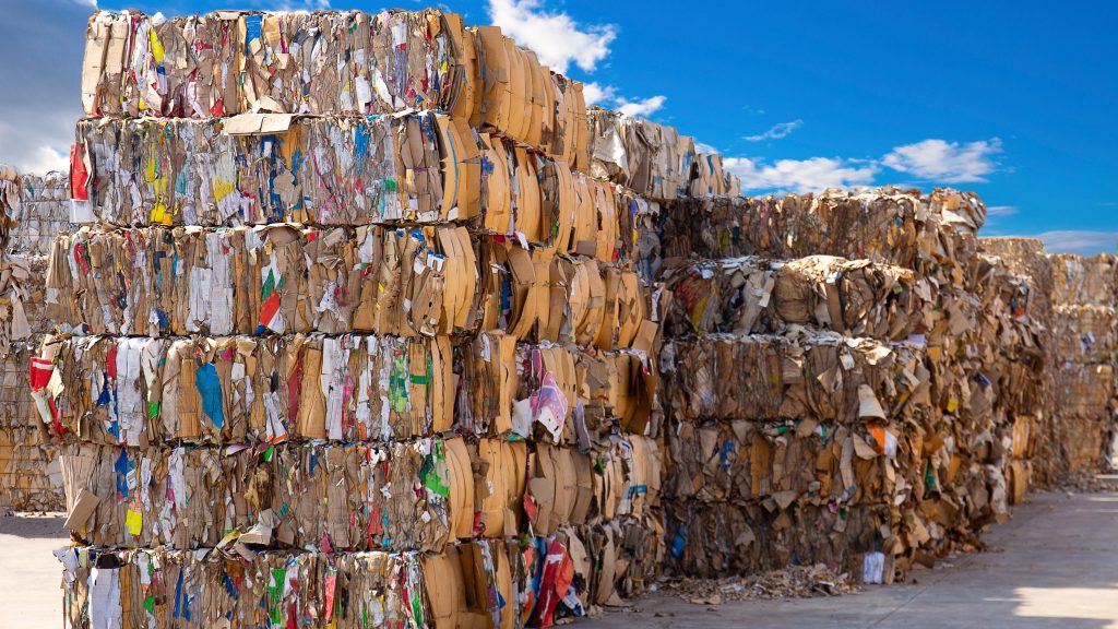 Stack,Of,Paper,Waste,Before,Shredding,At,Recycling,Plant